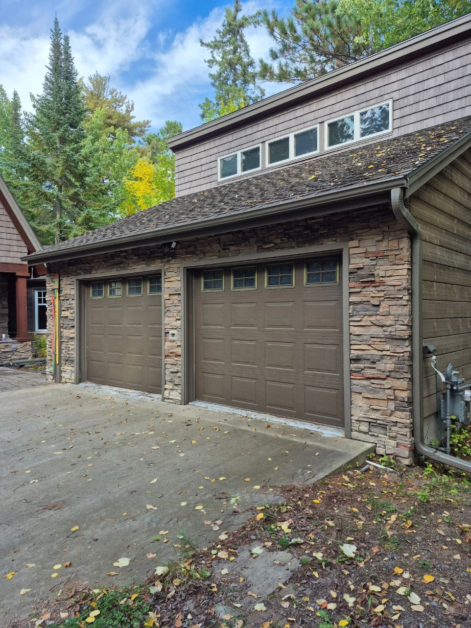 Gutter system installed on multi-garage home in International Falls